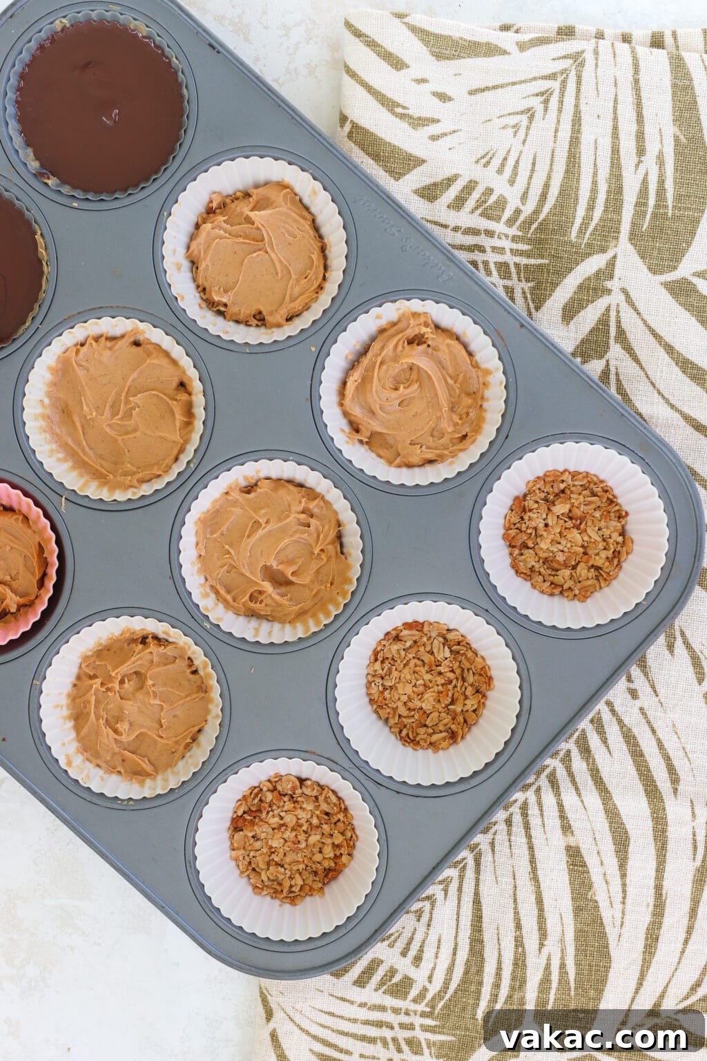 Finished peanut butter and baked oat cups with a smooth chocolate topping.