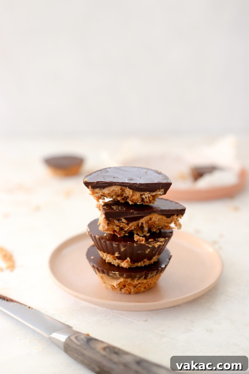 A tray of finished peanut butter and baked oat cups, ready to be enjoyed.