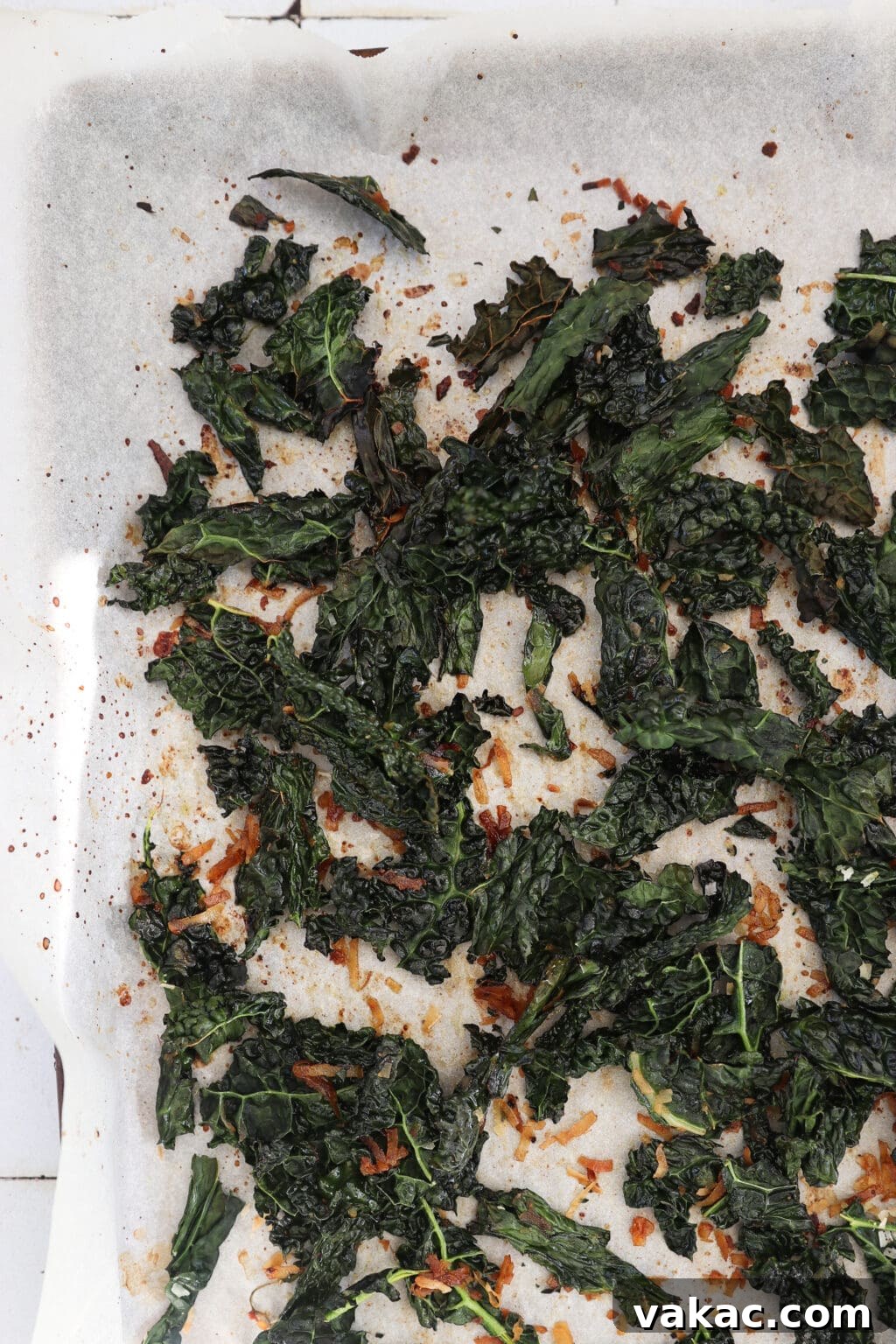 Quick Comfort: 4-Ingredient Warm Kale & Toasted Coconut Salad 9 Baked warm kale salad with toasted coconut after removing from oven.