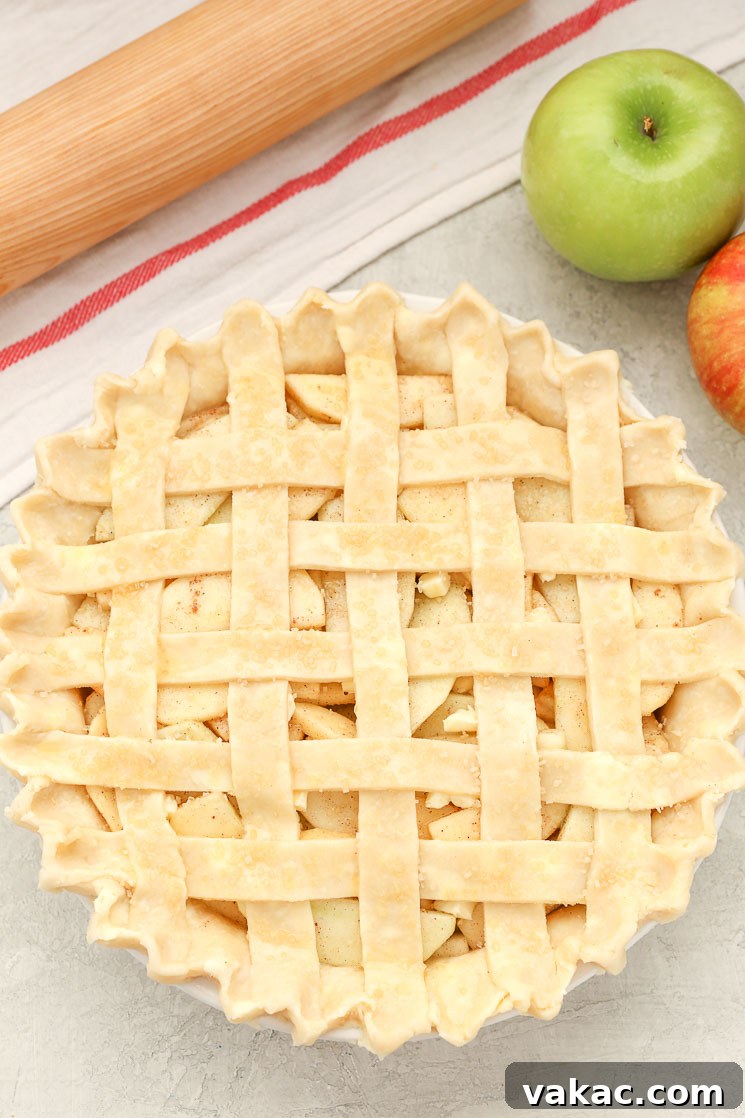 Learn how to make a lattice pie crust with this easy step-by-step tutorial. This simple technique is a beautiful decorative touch for almost any pie!