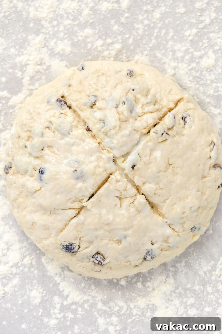 Traditional Irish Soda Bread 4 A loaf of Irish Soda Bread with an 'X' cut in the top.