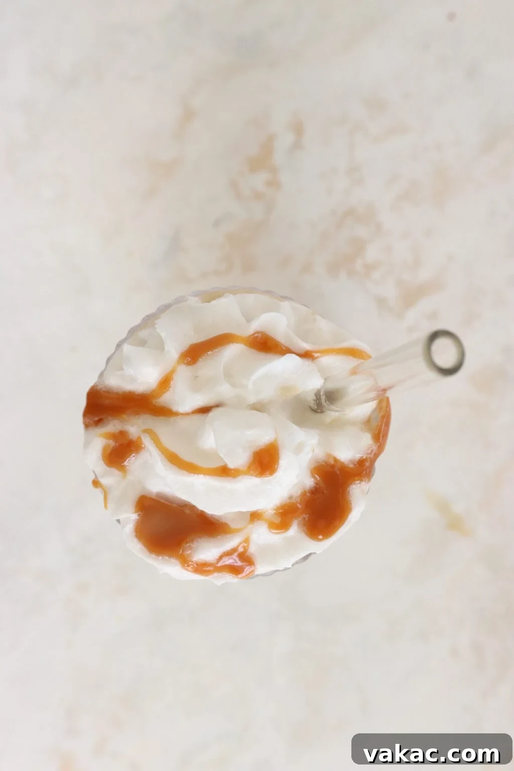 Protein Coffee Surge Smoothie 6 Whipped cream with caramel drizzle.