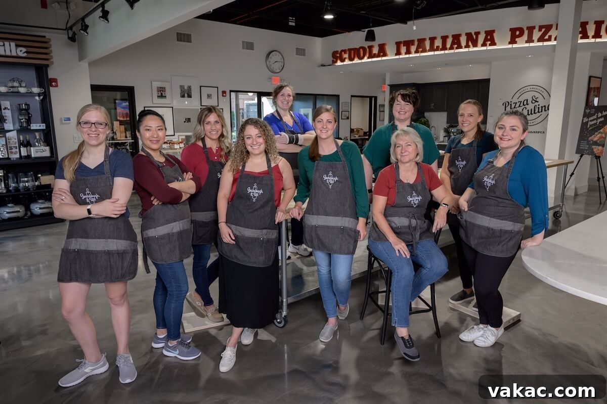 Sourdough Stars with Red Star 2 A group of enthusiastic food bloggers wearing aprons gather at a culinary event.