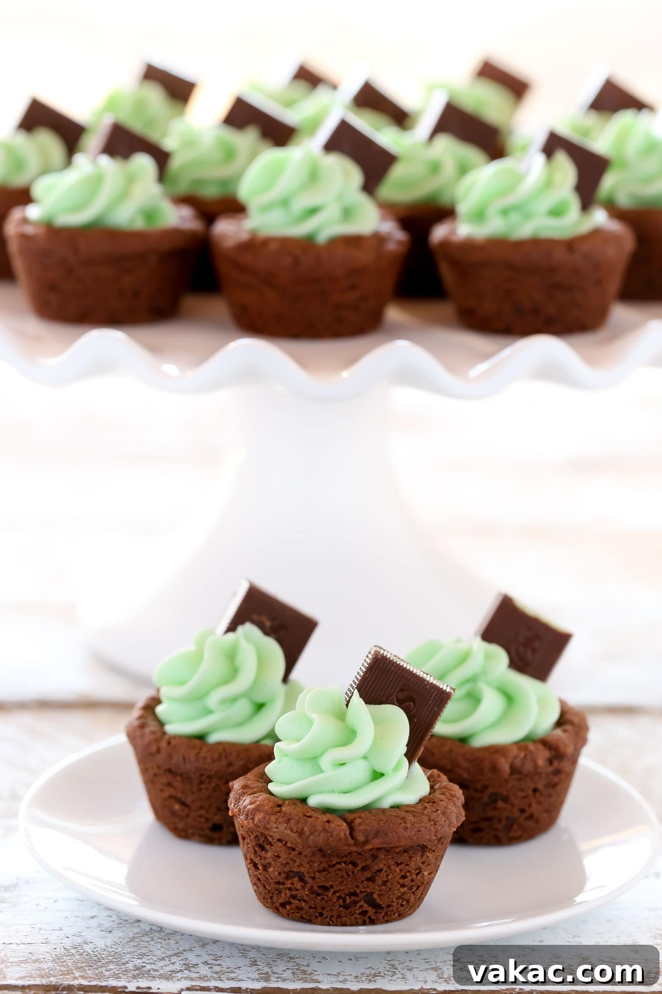 Refreshing Mint Chocolate Cookie Cups 3 Freshly baked chocolate cookie cups, still warm in a mini muffin pan, ready for the signature indentation.