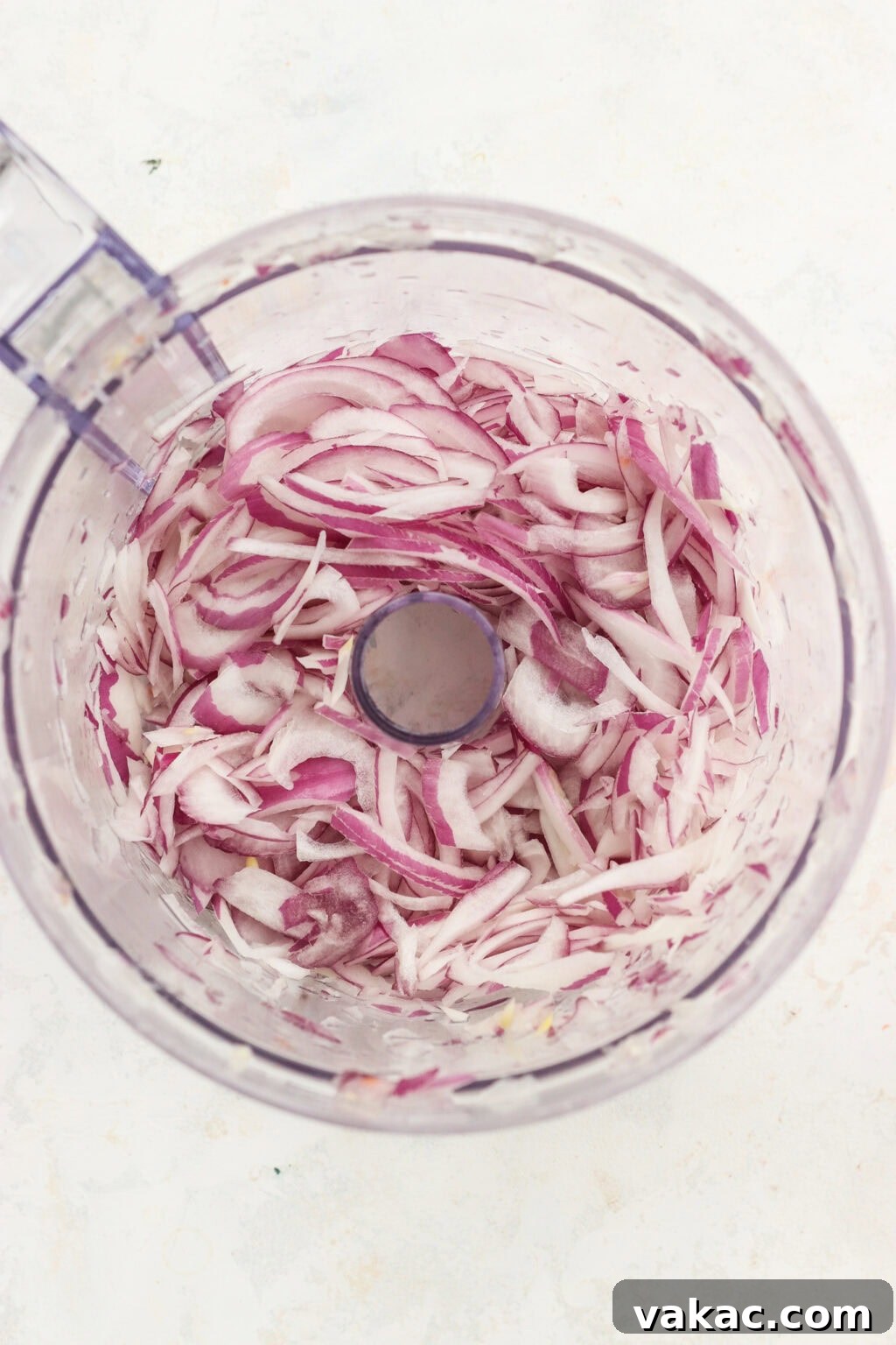 Whip Up Tangy Quick Pickled Red Onions 4 Shredded red onions in a food processor