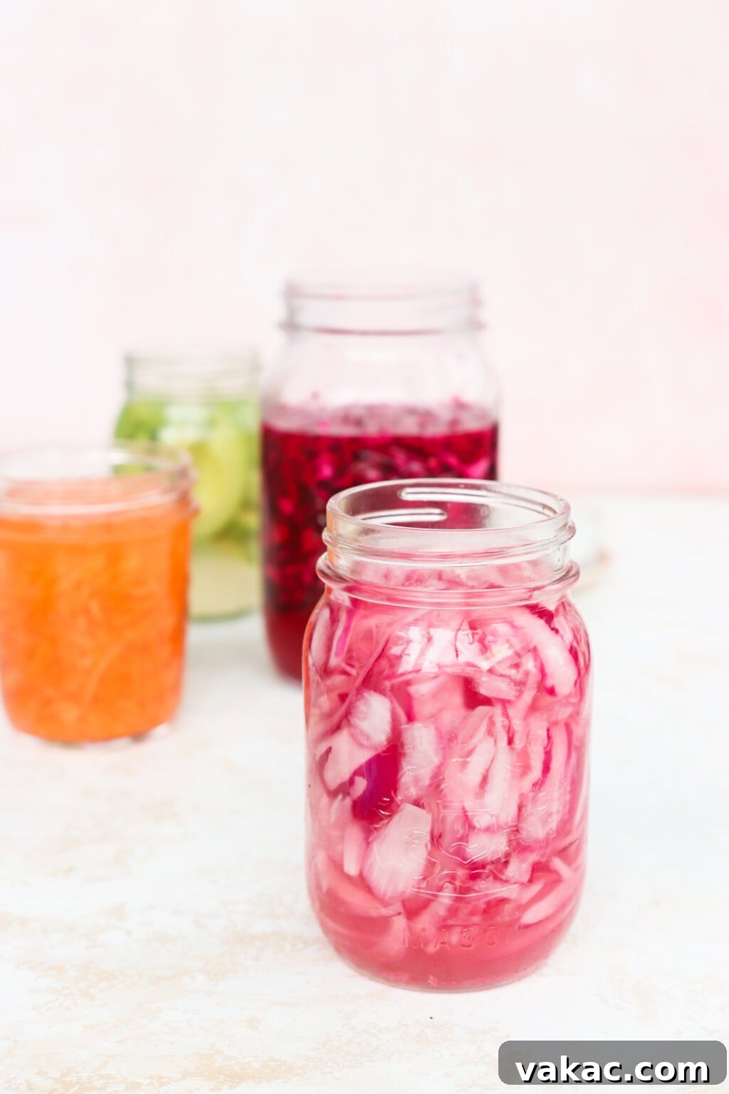 Whip Up Tangy Quick Pickled Red Onions 7 Quick pickled shredded carrots, red cabbage, avocados, and red onion in glass jars