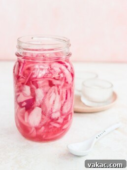 Quick pickled red onion in a glass jar