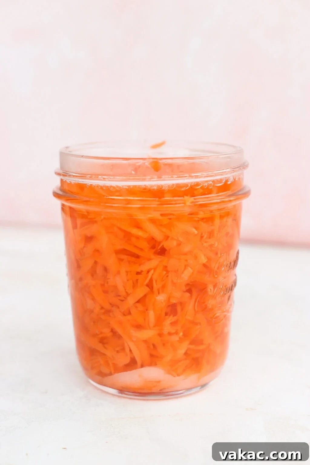 Flash Pickled Shredded Carrots 5 Quick pickled shredded carrots in a glass jar