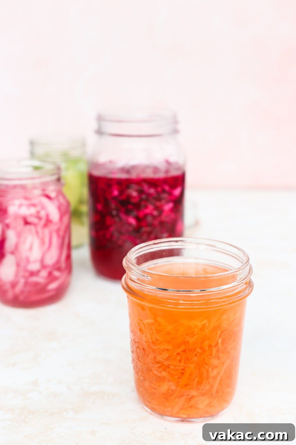 Flash Pickled Shredded Carrots 7 Quick pickled shredded carrots, red cabbage, avocados, and red onions in four glass jars