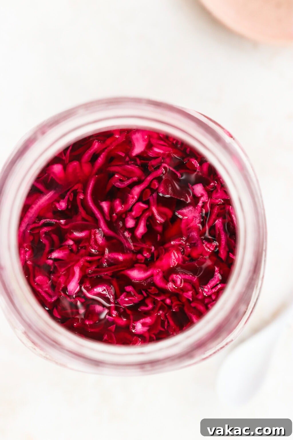 Quick Pickled Red Cabbage Made Easy 5 Quick pickled red cabbage ingredients being placed into a glass mason jar