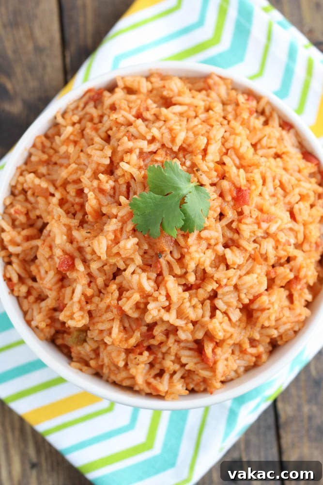 Restaurant-Style Mexican Rice 3 Close-up of fluffy Mexican Rice in a skillet