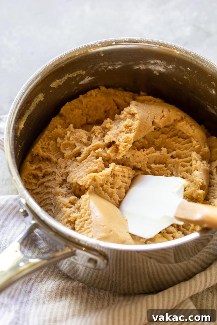 Ultimate Peanut Butter Fudge 4 Peanut butter fudge mixed up in a sauce pan.