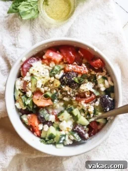 Easy Greek-Inspired Cottage Cheese Salad in a white bowl