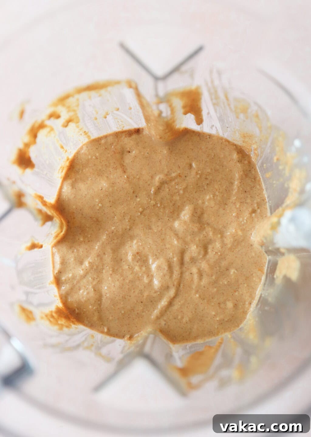 Power-Packed Pumpkin Cottage Cheese Pancakes 5 Ingredients for High Protein Pumpkin Pancakes with Cottage Cheese blended in a blender, including quick oats, pumpkin puree, cottage cheese, milk, eggs, baking powder, maple syrup, pumpkin pie spice, avocado oil