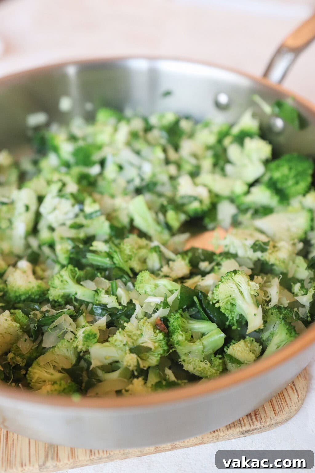 Hearty Protein Egg and Cottage Cheese Bake 4 A close-up of fresh broccoli florets in a bowl, ready to be added to the breakfast bake.