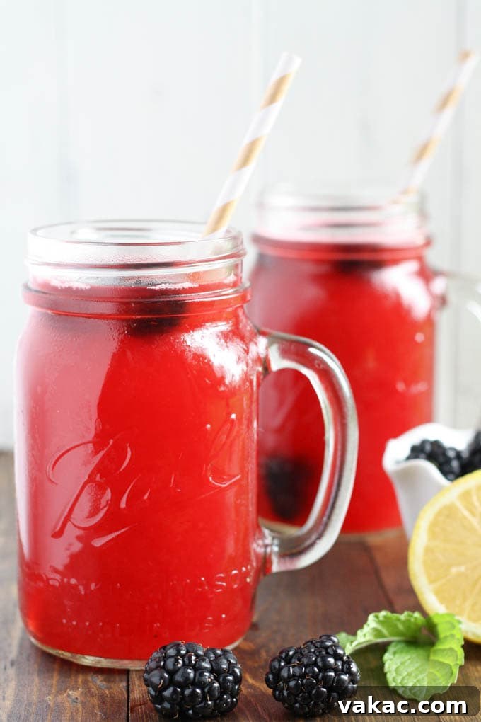 Midnight Bramble Quencher 3 Close-up of Fresh Blackberries and Lemons, Key Ingredients for Lemonade