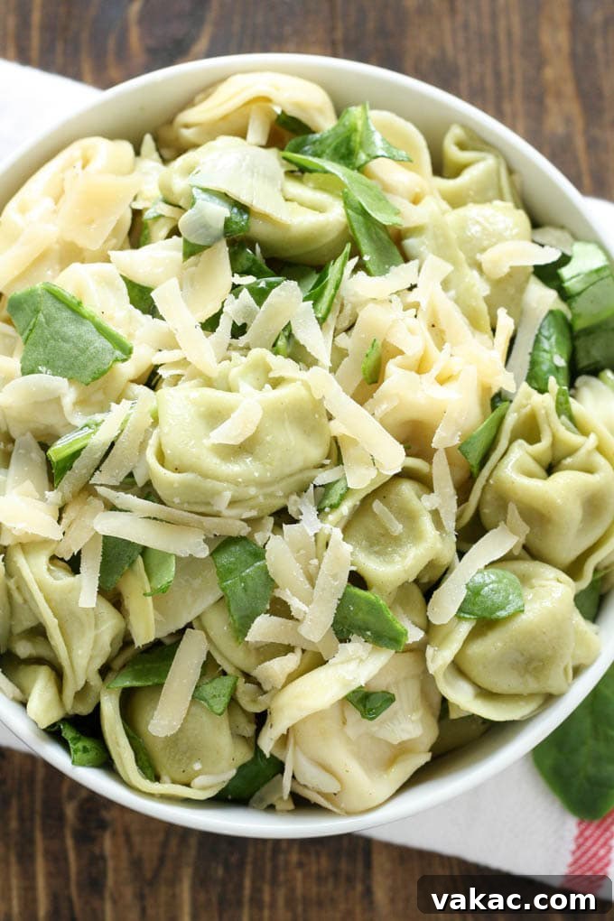 Creamy Spinach Artichoke Tortellini Salad 4 Close-up of Spinach Artichoke Tortellini Salad with vibrant ingredients