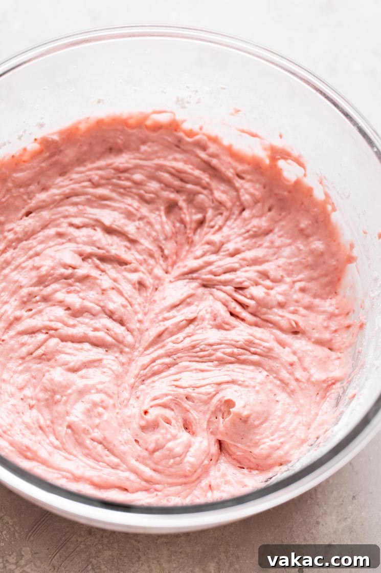 Luscious Strawberry Cupcakes 6 A glass mixing bowl of strawberry cupcake batter.