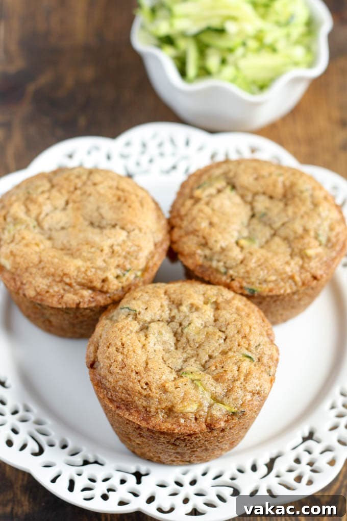 Inside view of a Moist Zucchini Muffin with Cream Cheese Center
