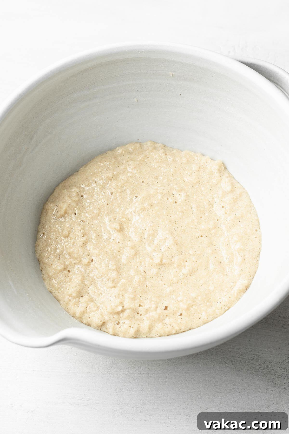 Wet ingredients in a large mixing bowl, ready to be combined.