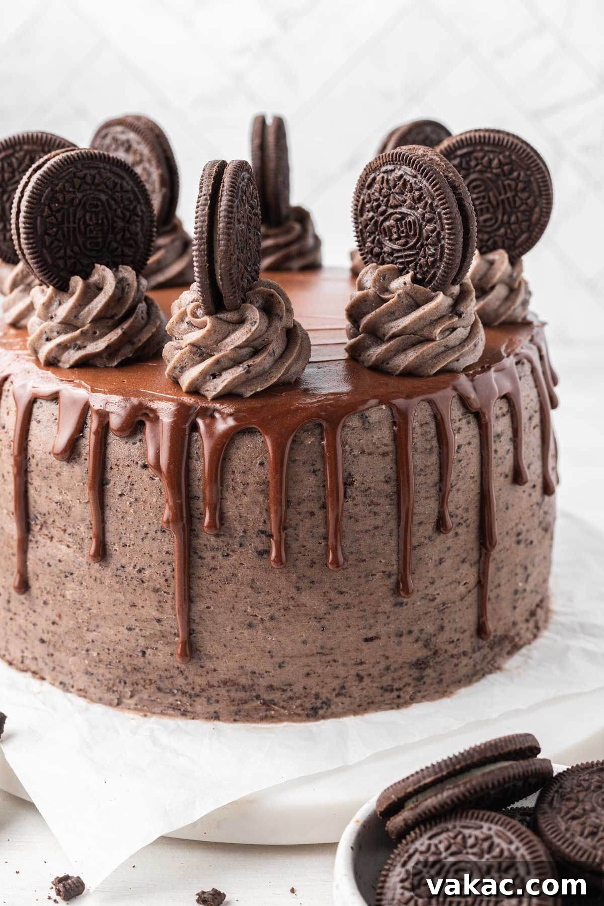 Cookies and Cream Dream Cake 2 A chocolate Oreo cake, decorated with a chocolate ganache drip, swirls of frosting, and whole Oreos.