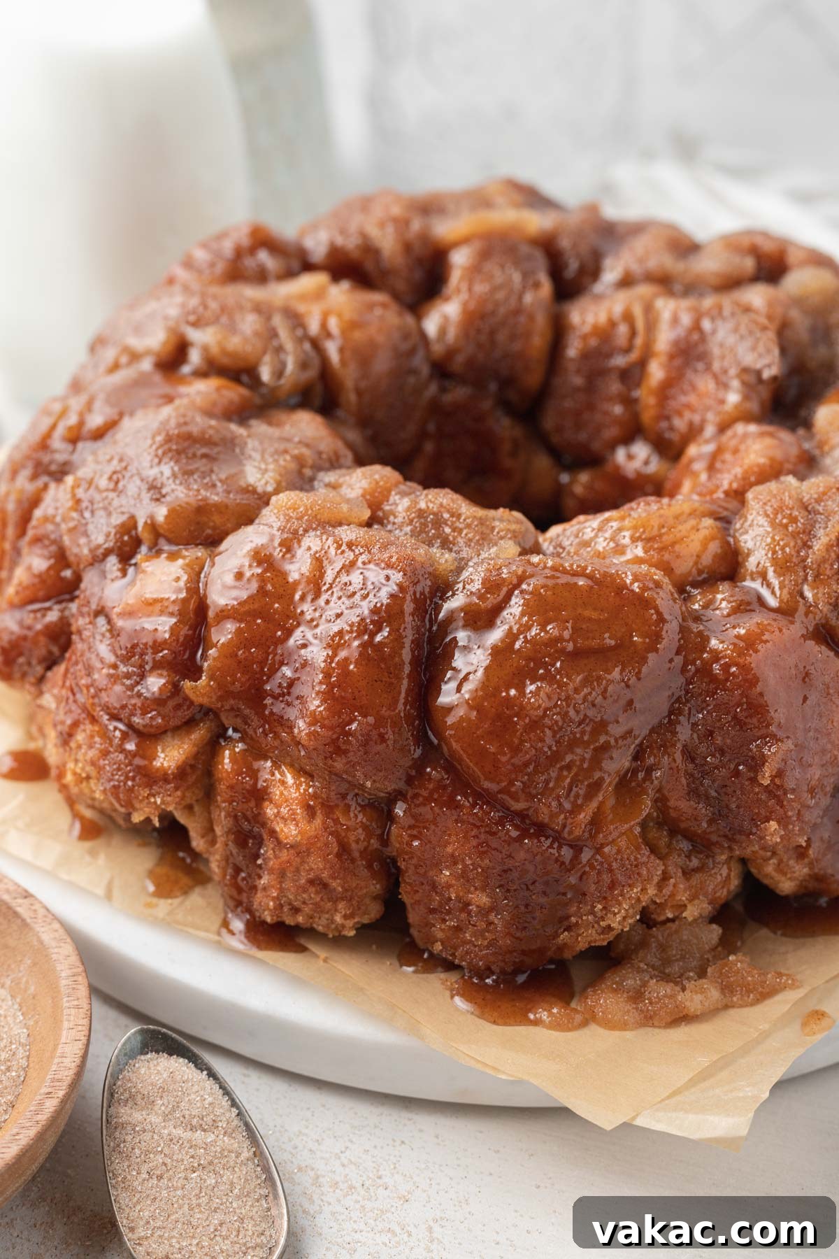 Warm Caramel Pull-Apart Delight 2 Homemade monkey bread with caramel sauce on a round platter, ready to be served.