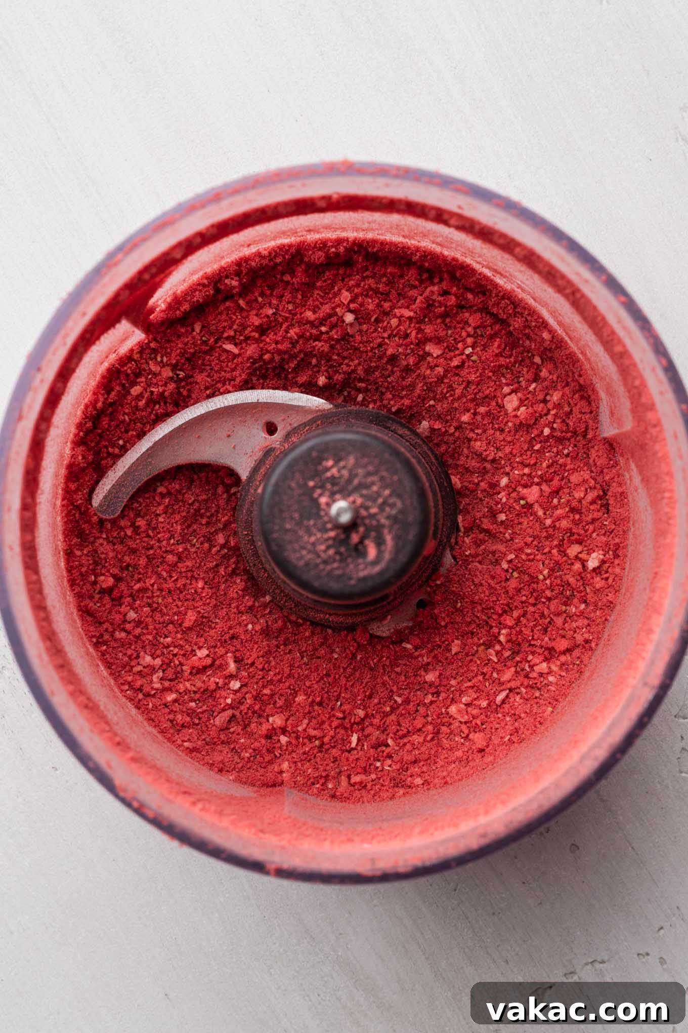 Freeze dried strawberries blended into a fine powder in a food processor.