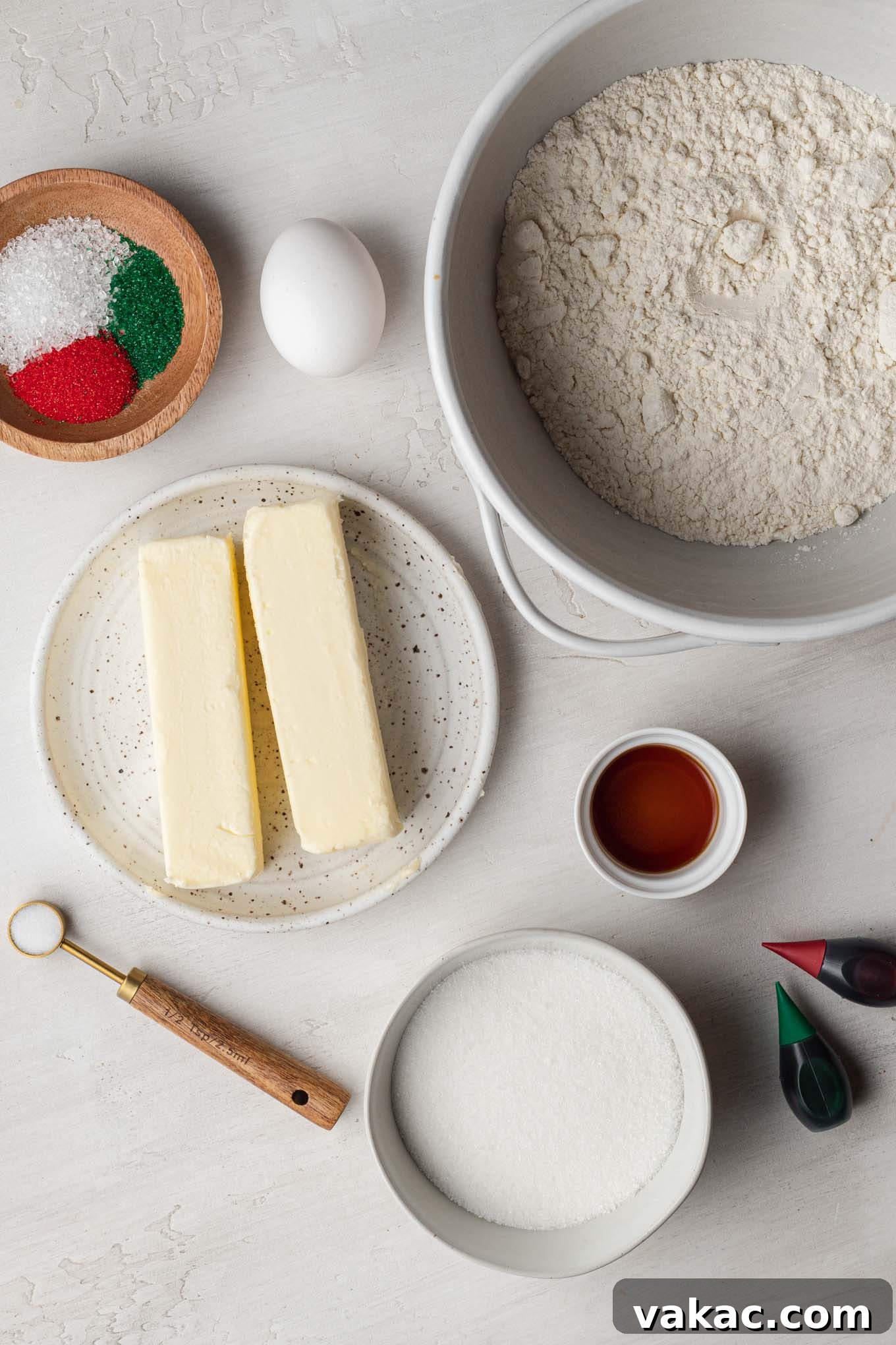 Buttery Spritz Cookies 3 An overhead view showcasing the essential ingredients needed to craft delicious butter spritz cookies.