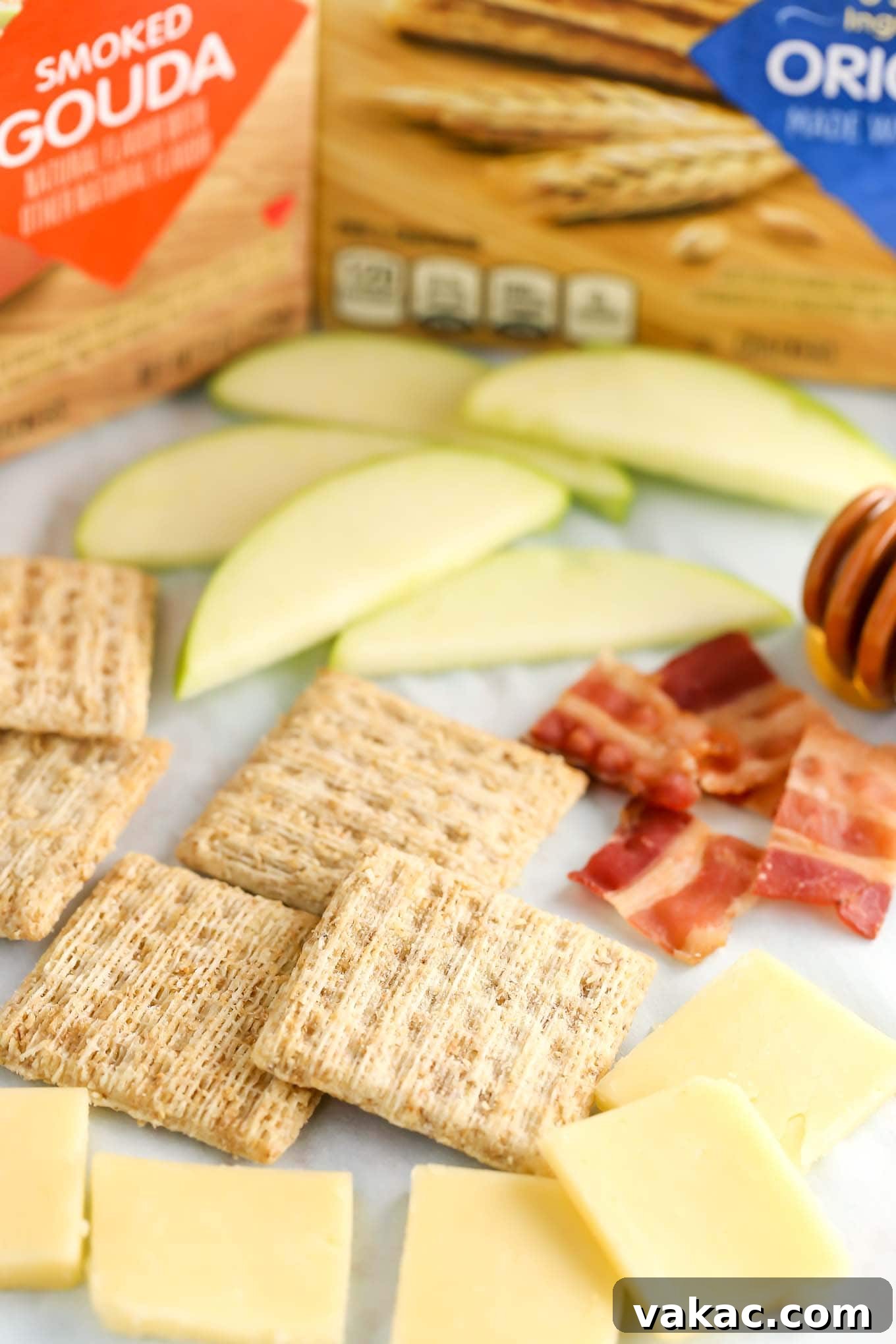 Sweet & Smoky Apple Bacon Gouda Bites 3 Ingredients for Smoked Gouda, Apple, Bacon, and Honey Bites featuring TRISCUIT Smoked Gouda Crackers