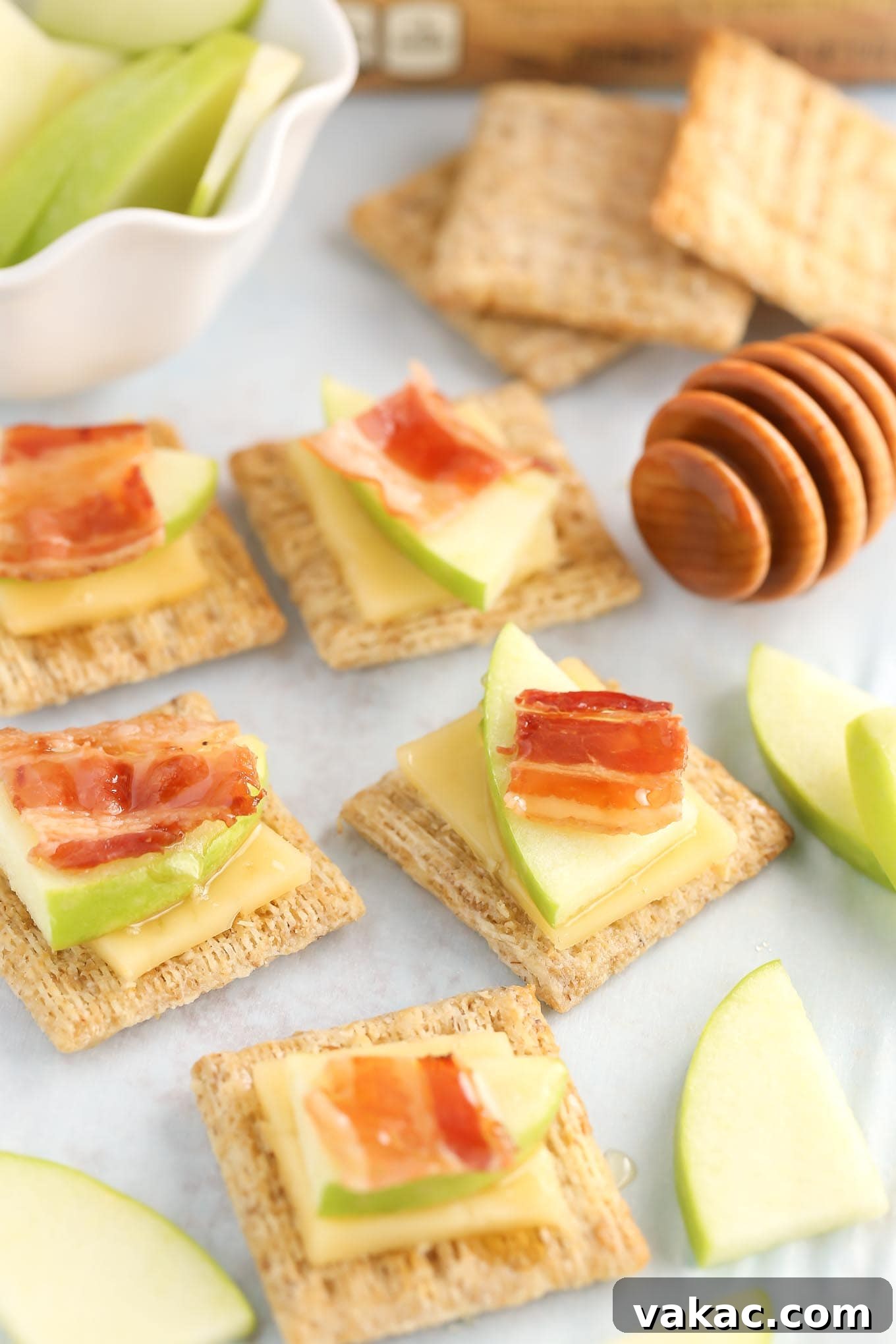 Sweet & Smoky Apple Bacon Gouda Bites 5 Platter of Smoked Gouda, Apple, Bacon, and Honey Bites for a party appetizer.