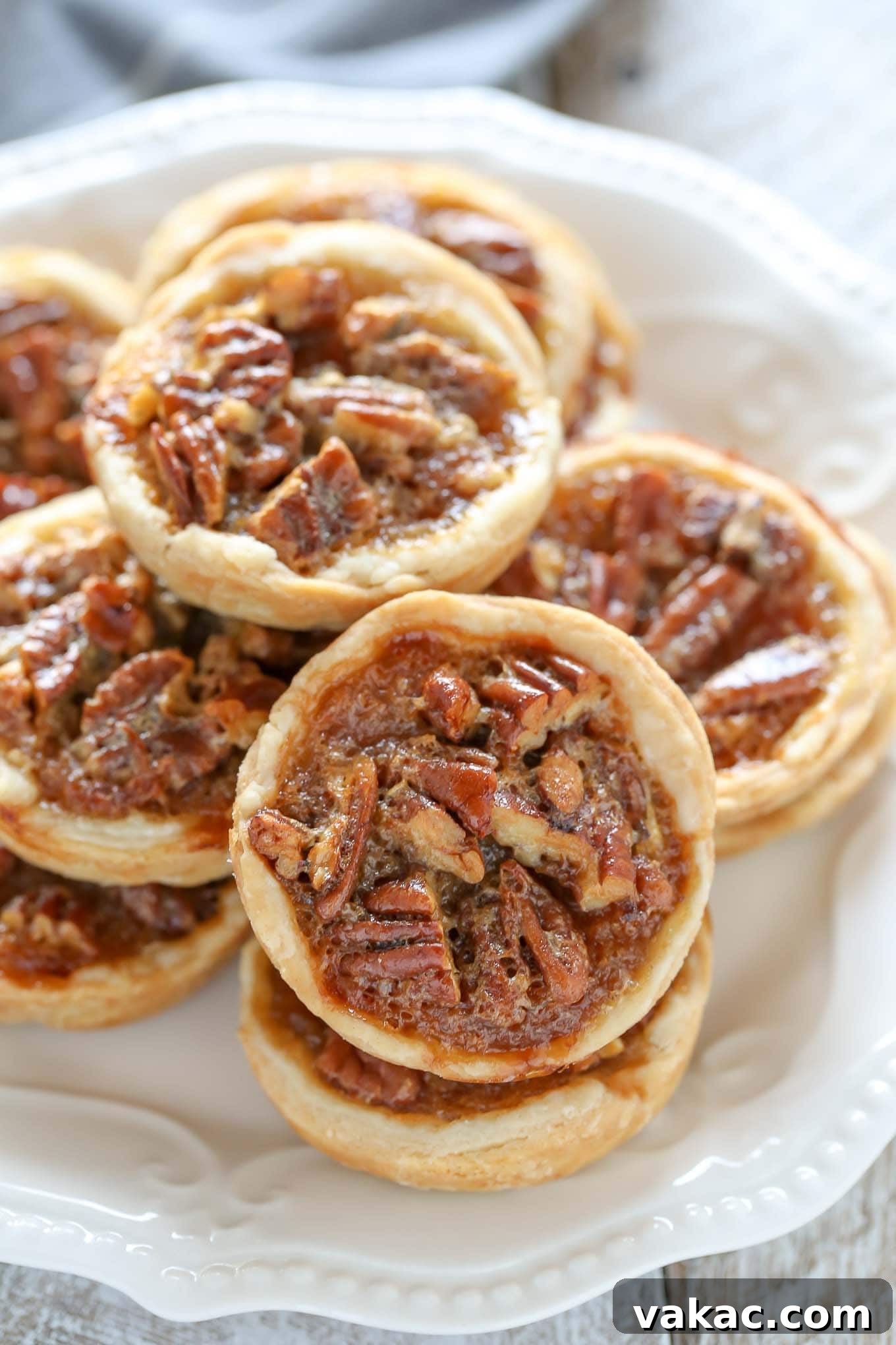 Tiny Pecan Treasures 4 Unbaked mini pecan pie crusts pressed into a muffin pan, ready to be filled with the delicious pecan mixture.