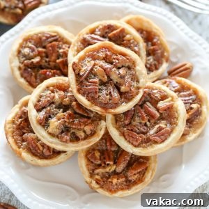 Tiny Pecan Treasures 5 Small square image of a finished mini pecan pie, highlighting its individual serving size.