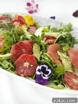 Refreshing Citrus Salad with Blood Orange and Mint served on a white plate
