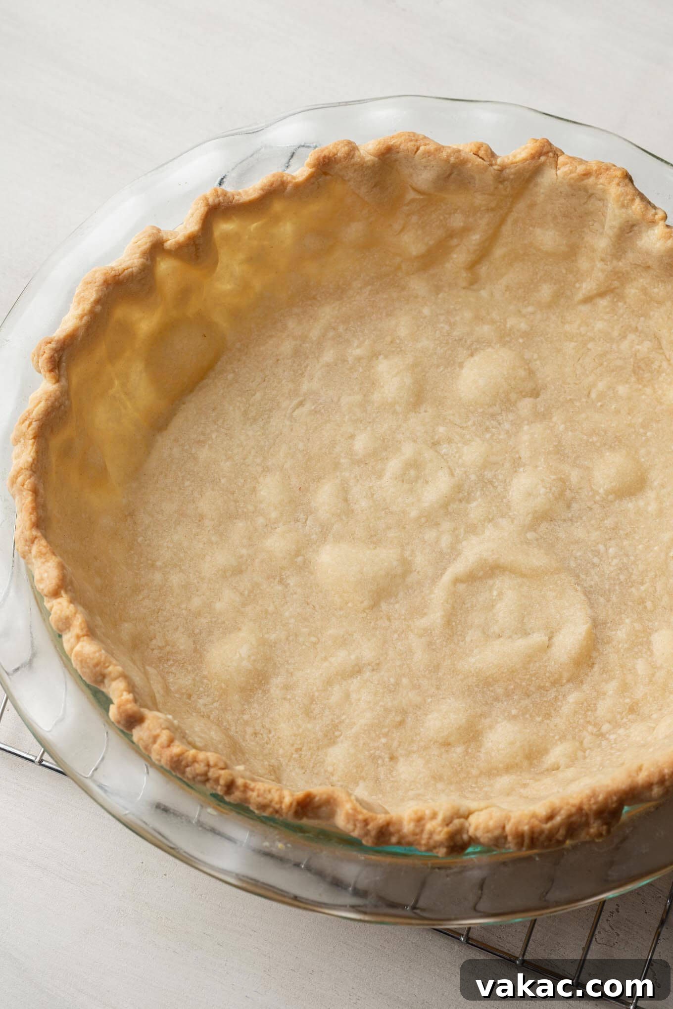 Decadent Chocolate Dream Pie 4 A blind baked pie crust in a glass pie plate.