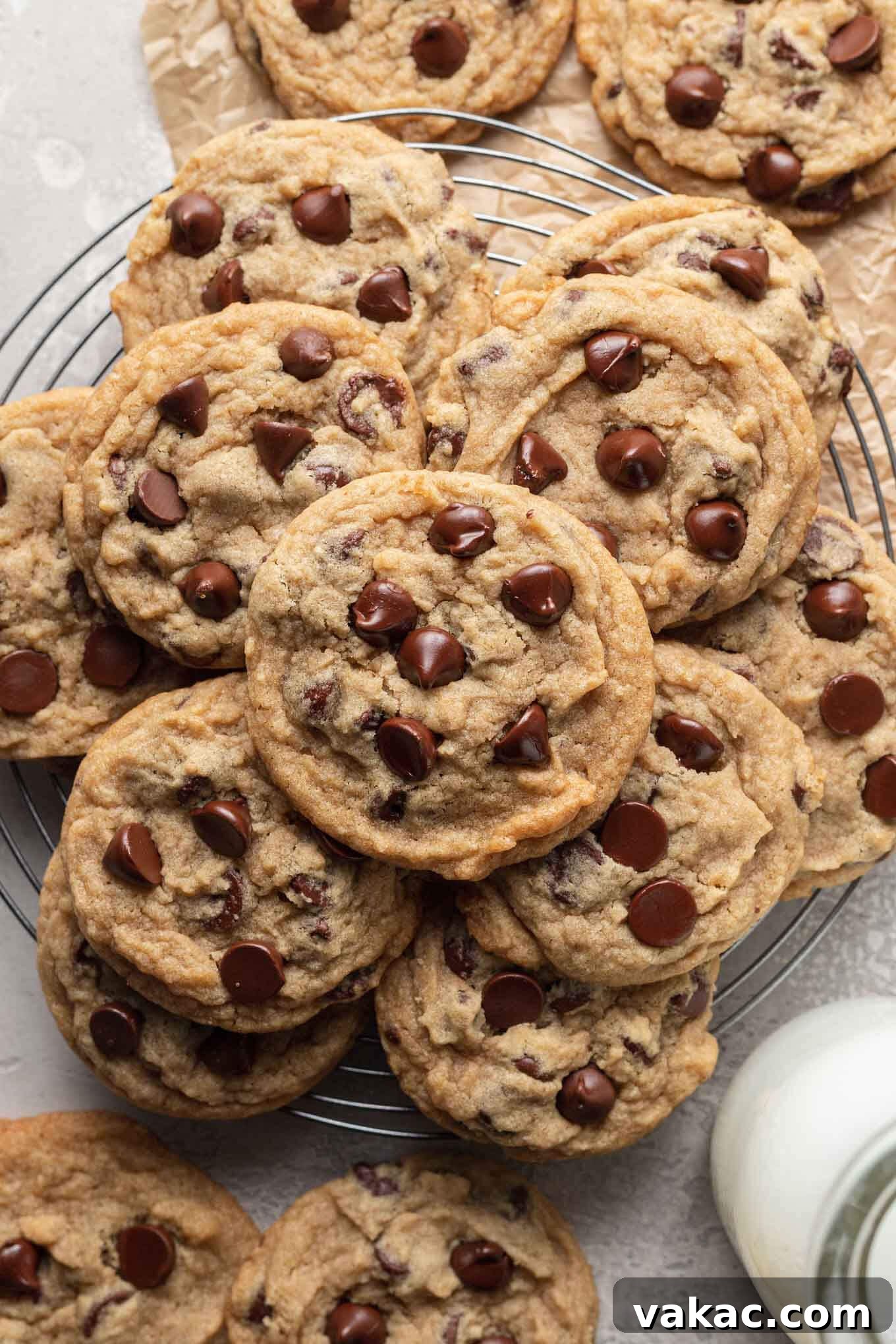 Egg-Free Chocolate Chip Bliss 7 An overhead view of egg-free chocolate chip cookies stacked on a wire cooling rack.