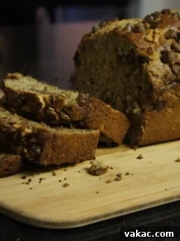 A slice of moist banana bread with chocolate chips