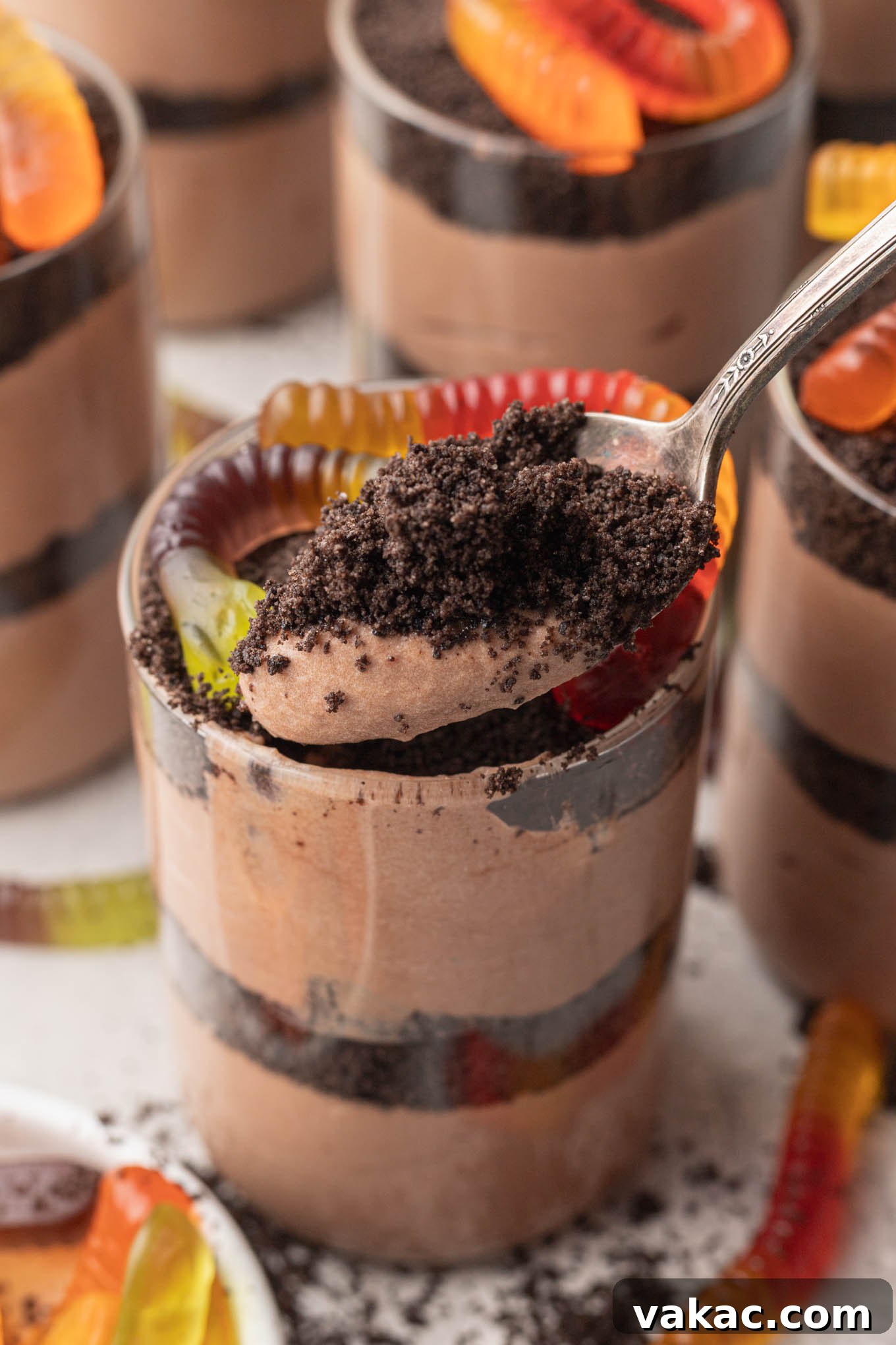 Sweet Soil Treats 11 A spoonful of creamy chocolate pudding and crunchy Oreo crumbs, taken directly from a dirt cup.
