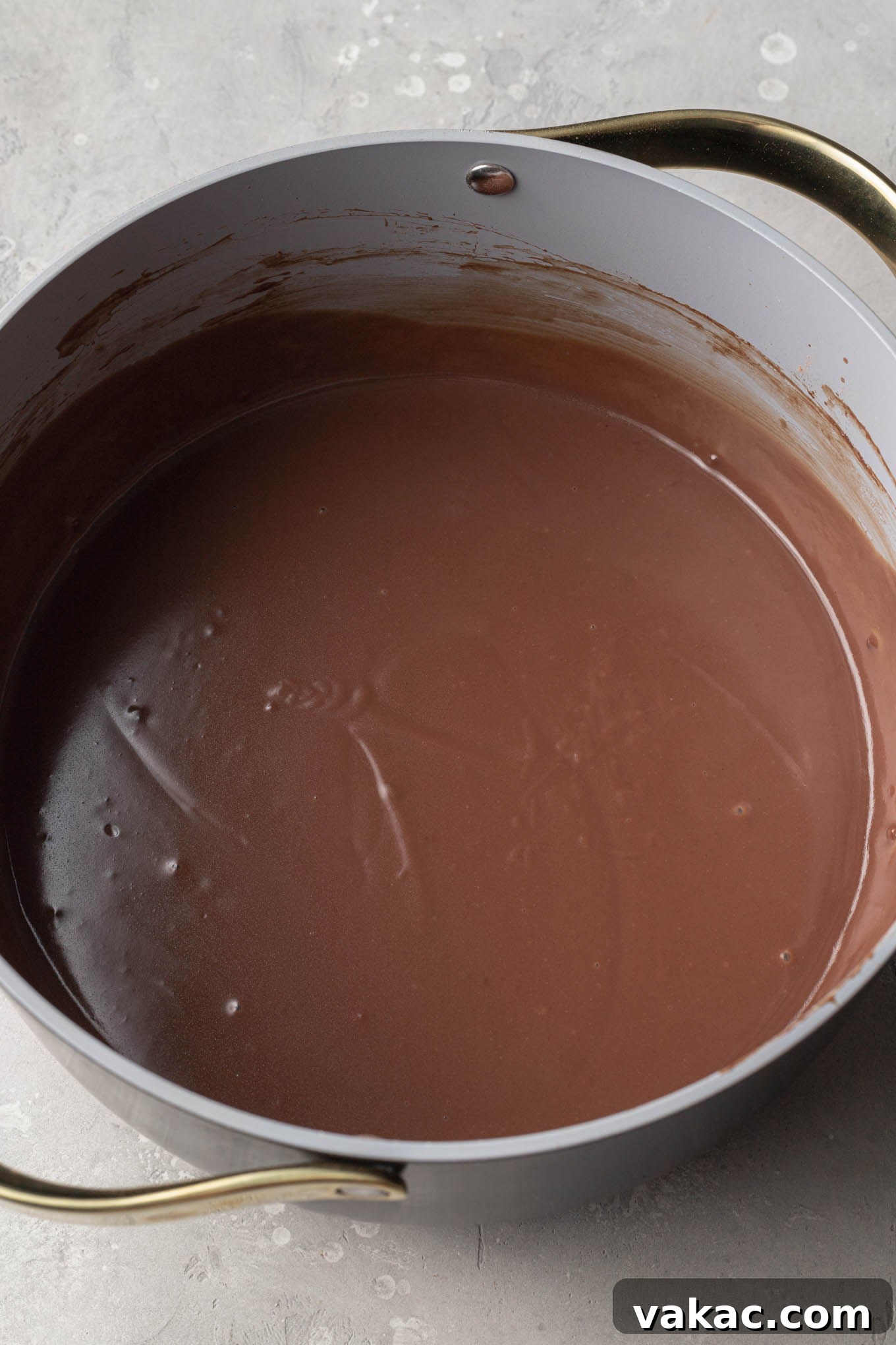 Sweet Soil Treats 4 An overhead view of homemade chocolate pudding simmering in a saucepan.