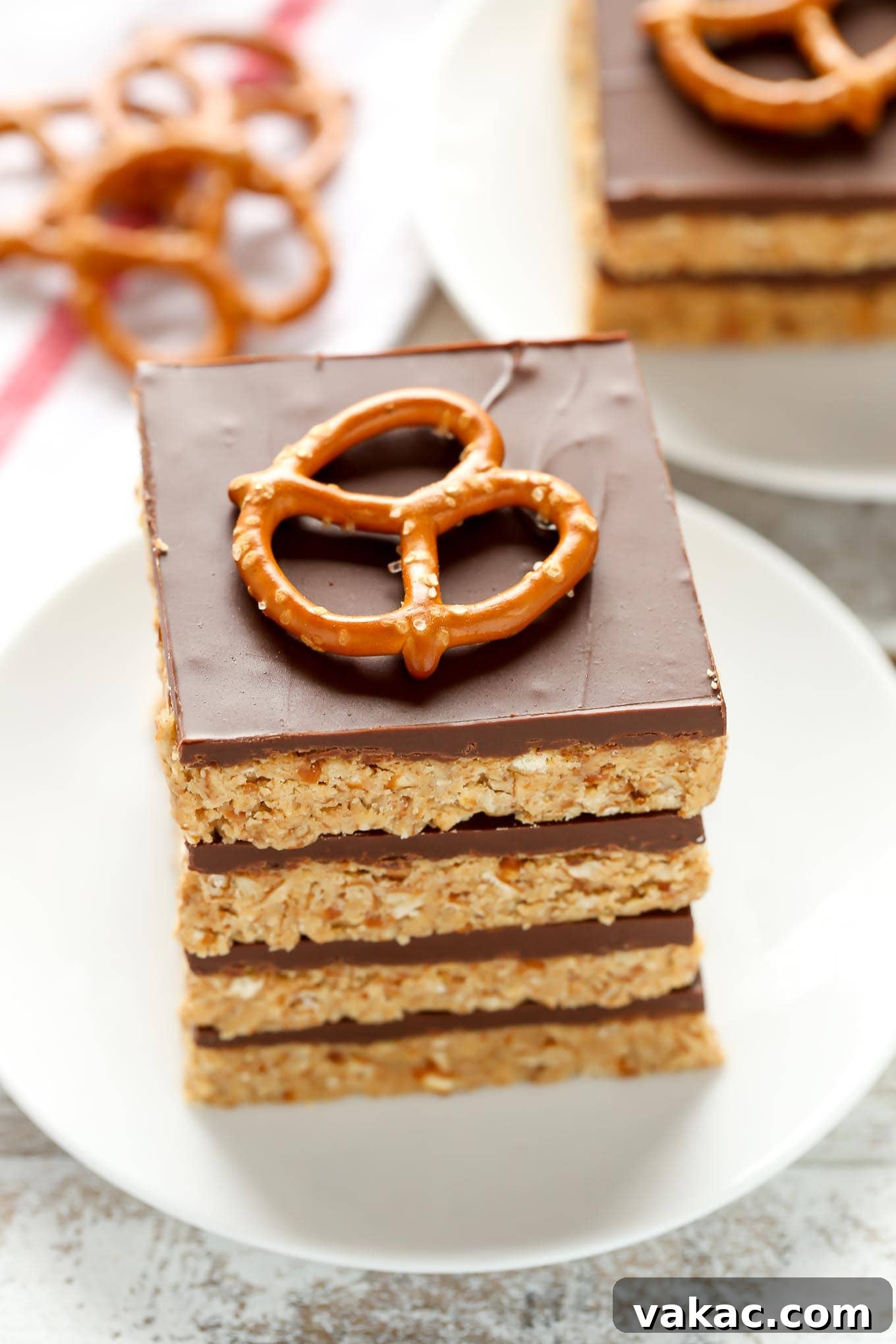 Close-up of the delicious layers of a No-Bake Peanut Butter Pretzel Bar, showcasing its texture and appeal.