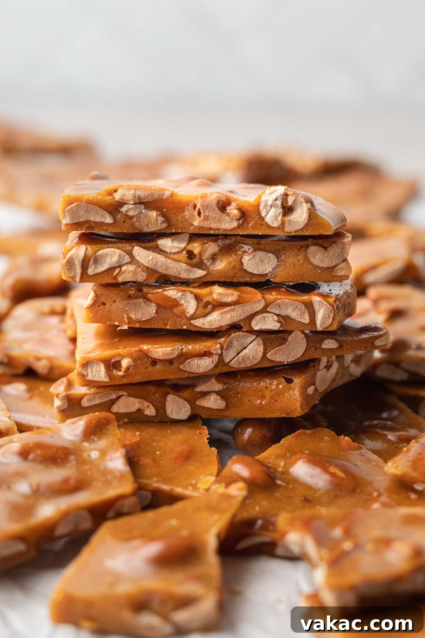 Sweet Peanut Crunch 2 A stack of buttery homemade peanut brittle, seen from the side.