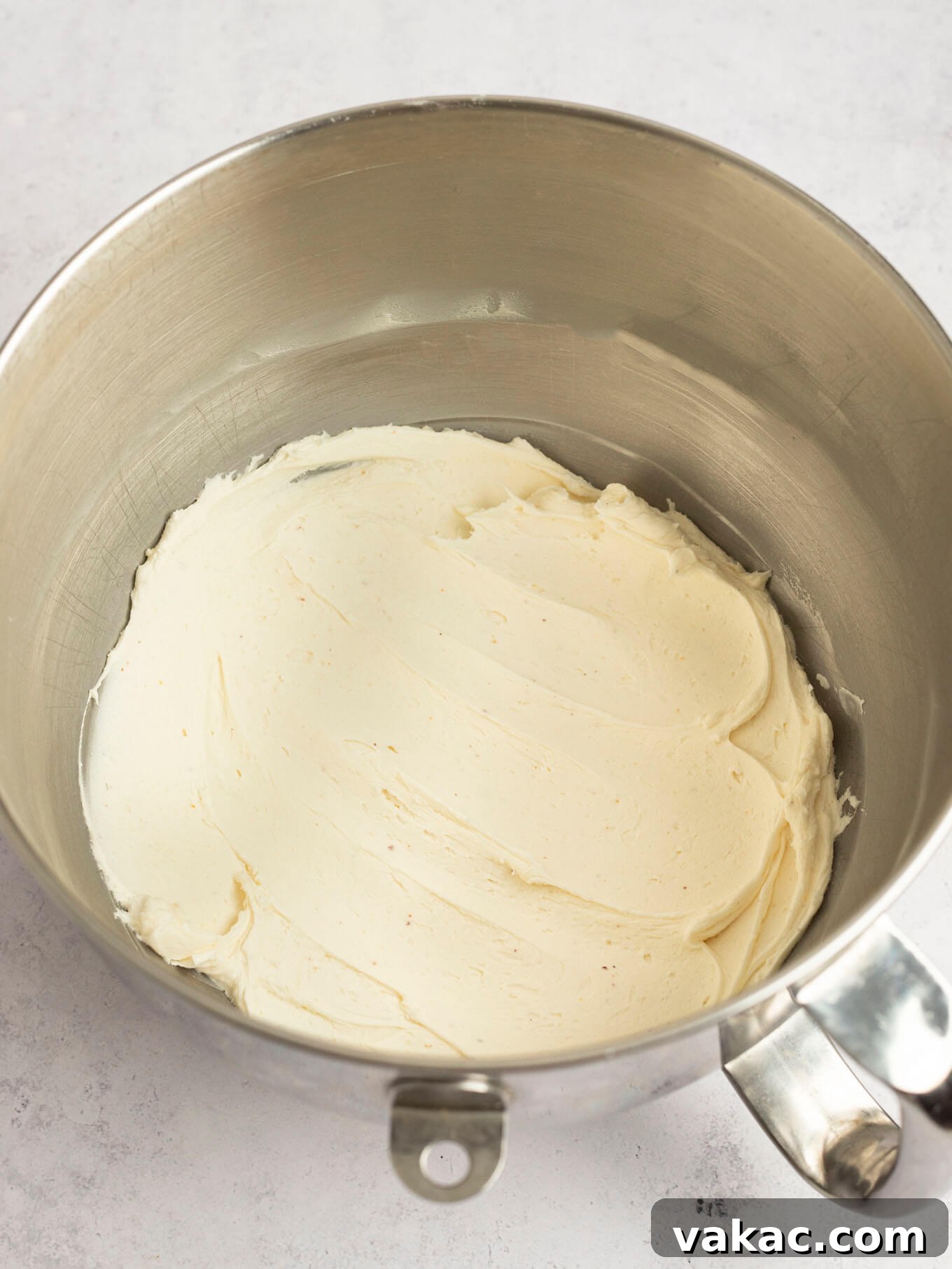 Caramelized Buttercream Dream 9 Smooth, creamy brown butter frosting fully mixed in the bowl of a stand mixer.
