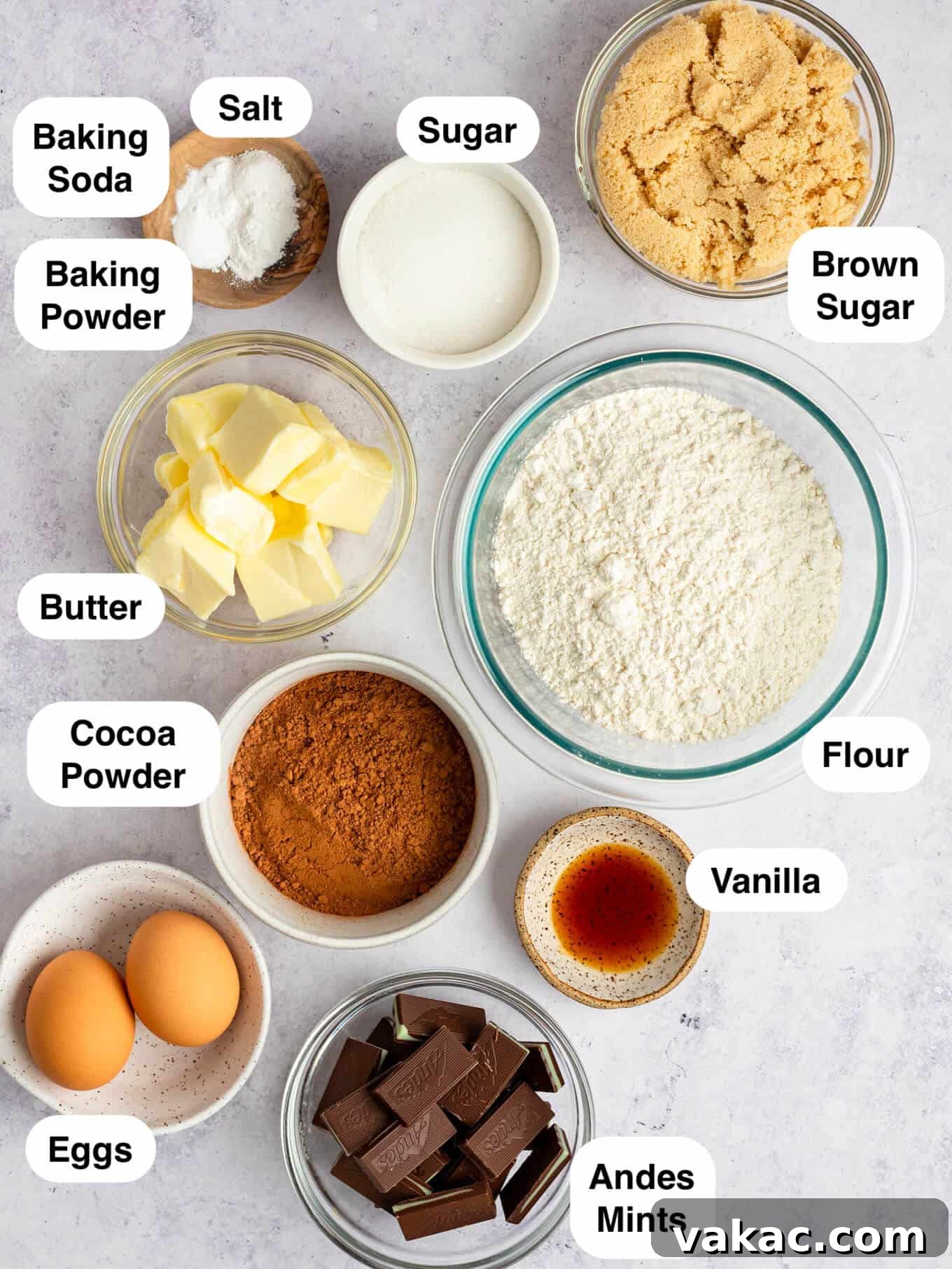 An overhead view showcasing all the essential ingredients for baking Andes mint cookies, neatly arranged on a counter.