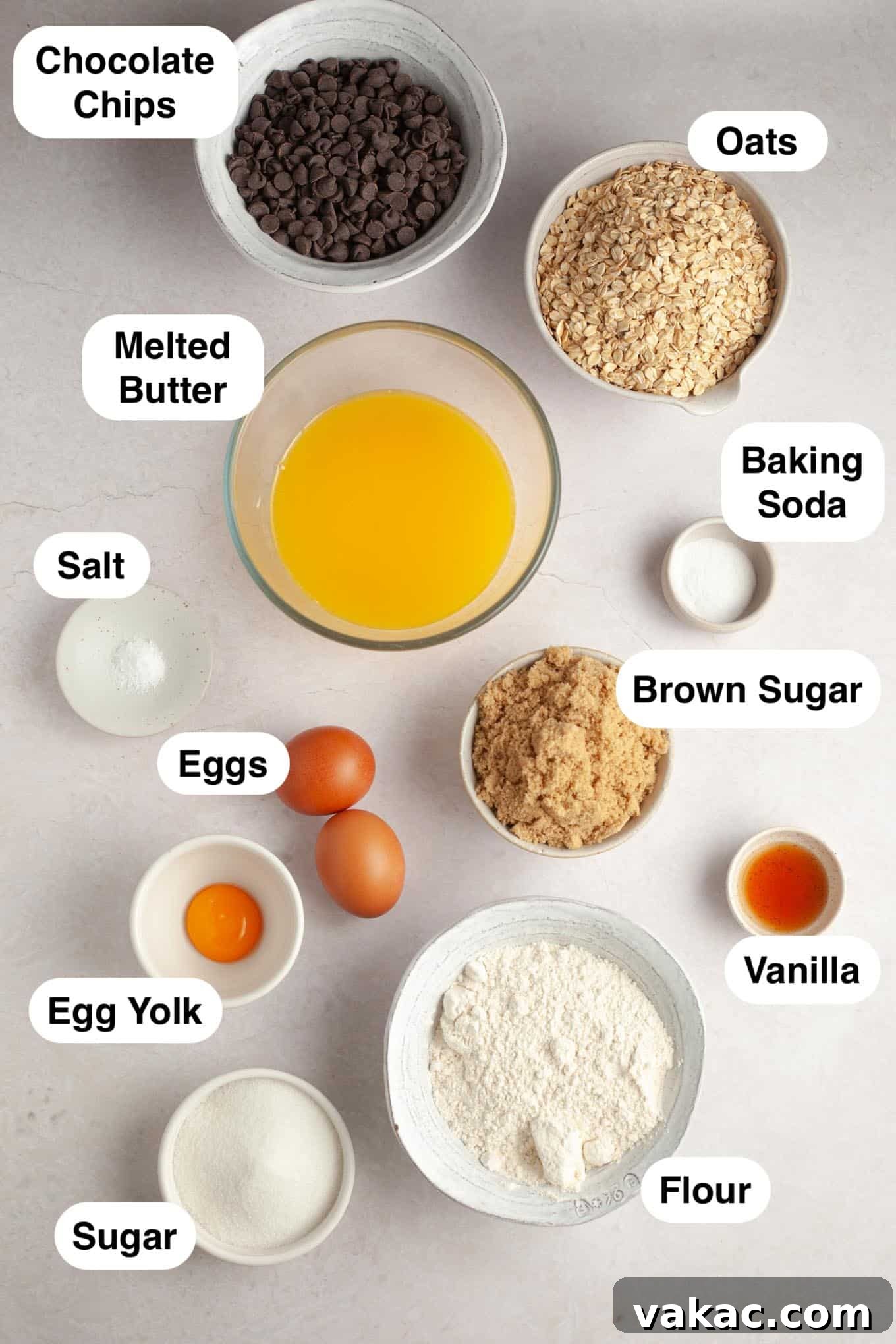 Golden Oatmeal Bars 3 An overhead view of various ingredients meticulously arranged on a clean surface, ready for making oatmeal cookie bars.