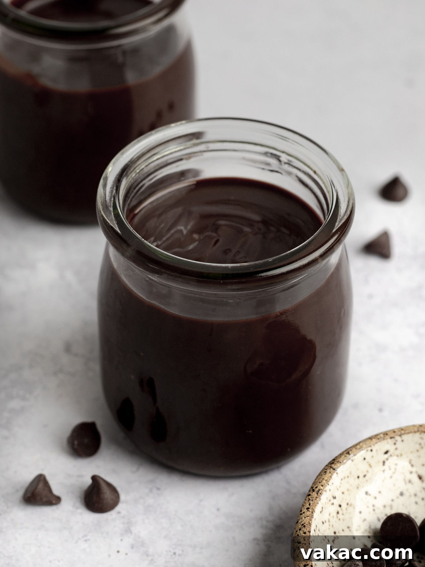 Decadent Homemade Hot Fudge Sauce 9 A glass jar of homemade hot fudge.