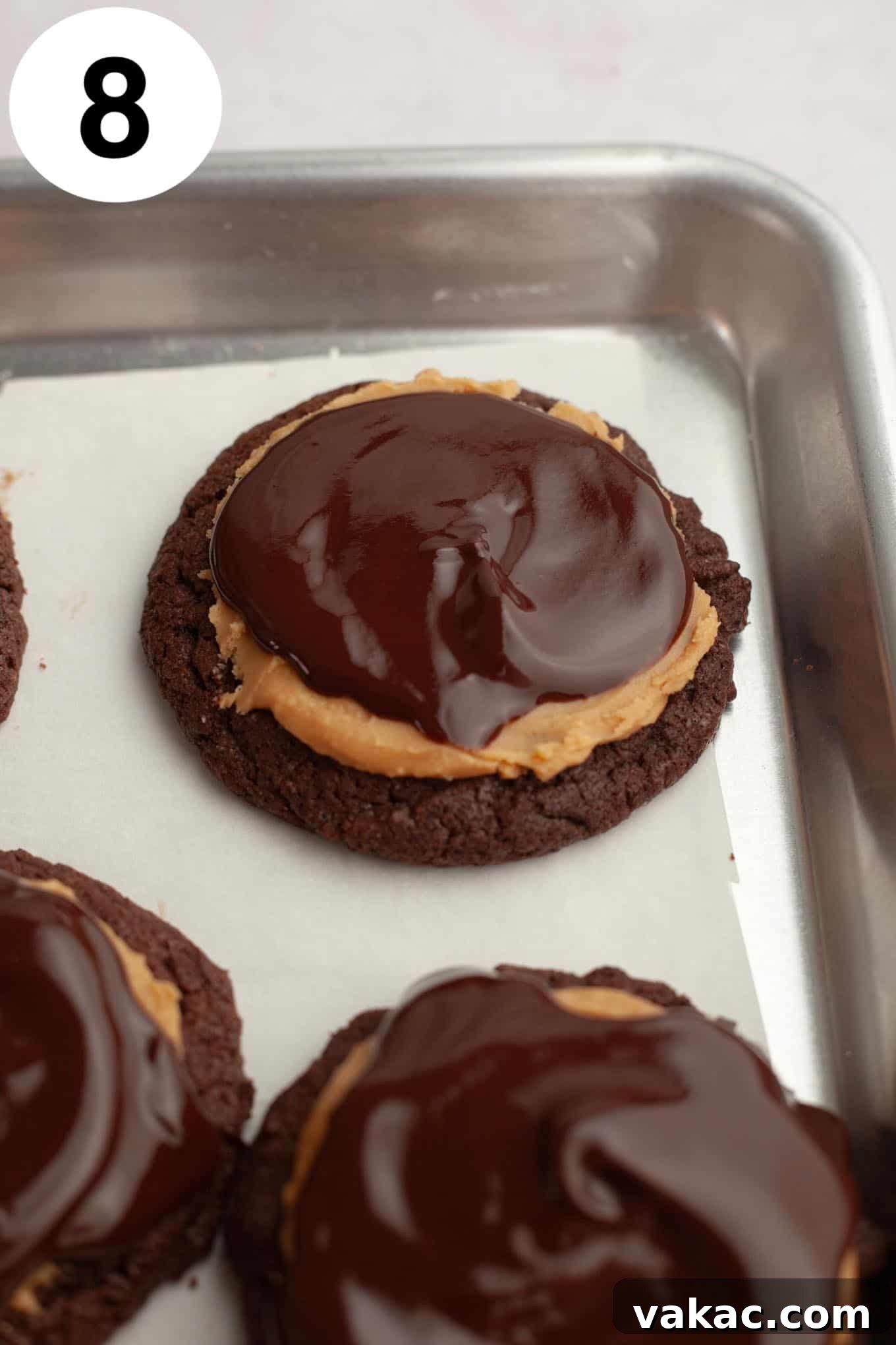 An overhead view of chocolate-topped Buckeye cookies.