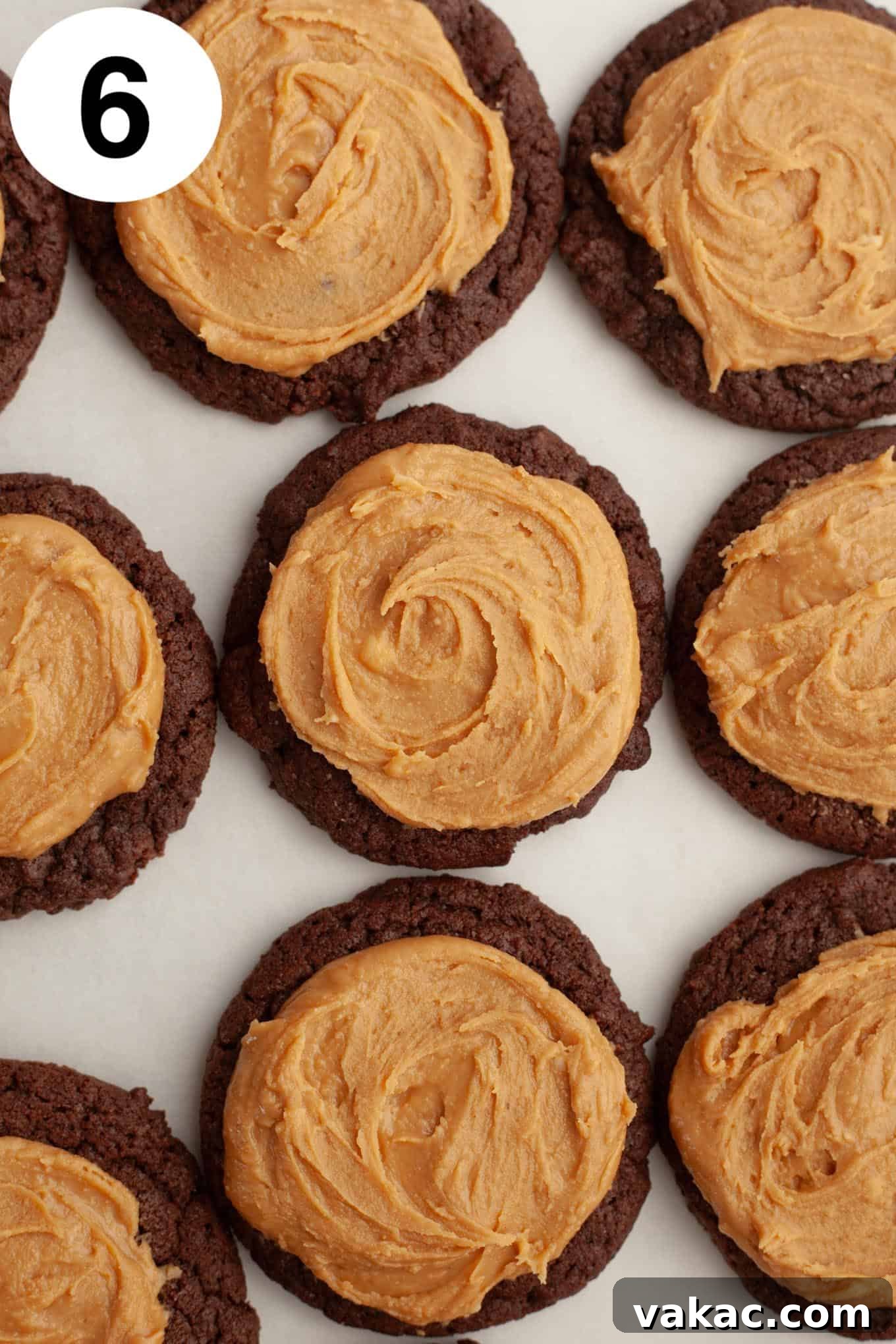 An overhead view of peanut butter-topped chocolate cookies.