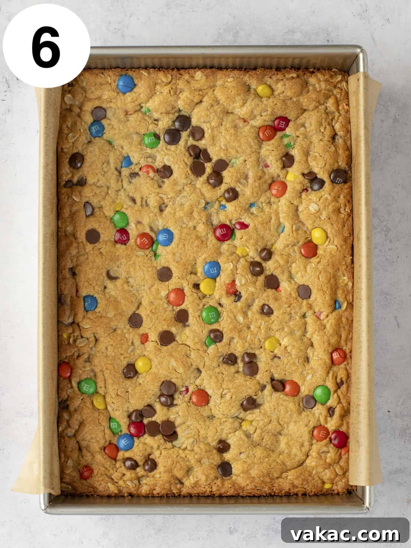 Ultimate Everything Cookie Bars 9 An overhead view of freshly baked monster cookie bars, golden brown and still in the baking dish, just removed from the oven.