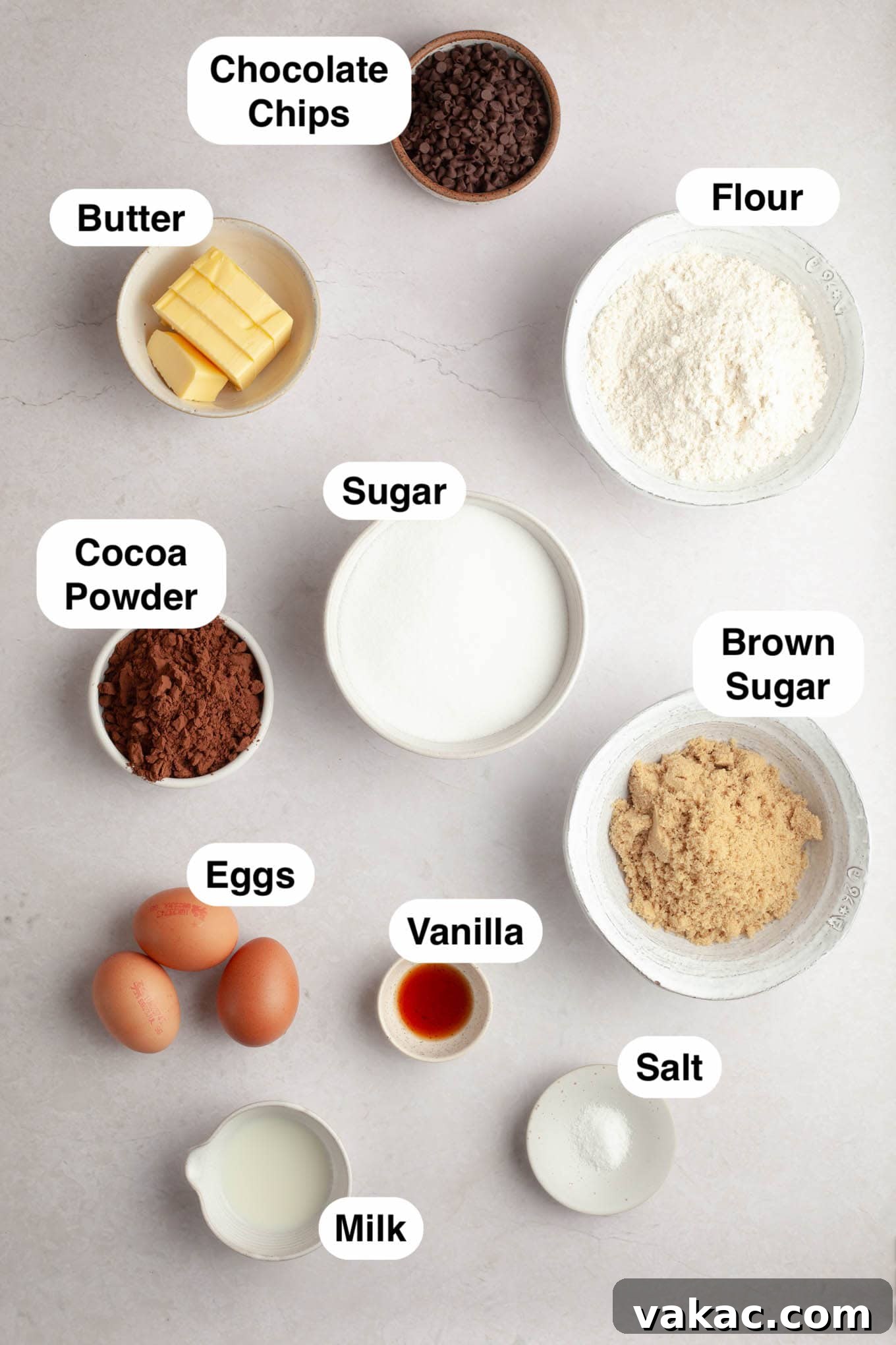 Brownie Cookie Dough Perfection 3 An overhead view of the various ingredients for making cookie dough brownies, neatly arranged on a flat surface.