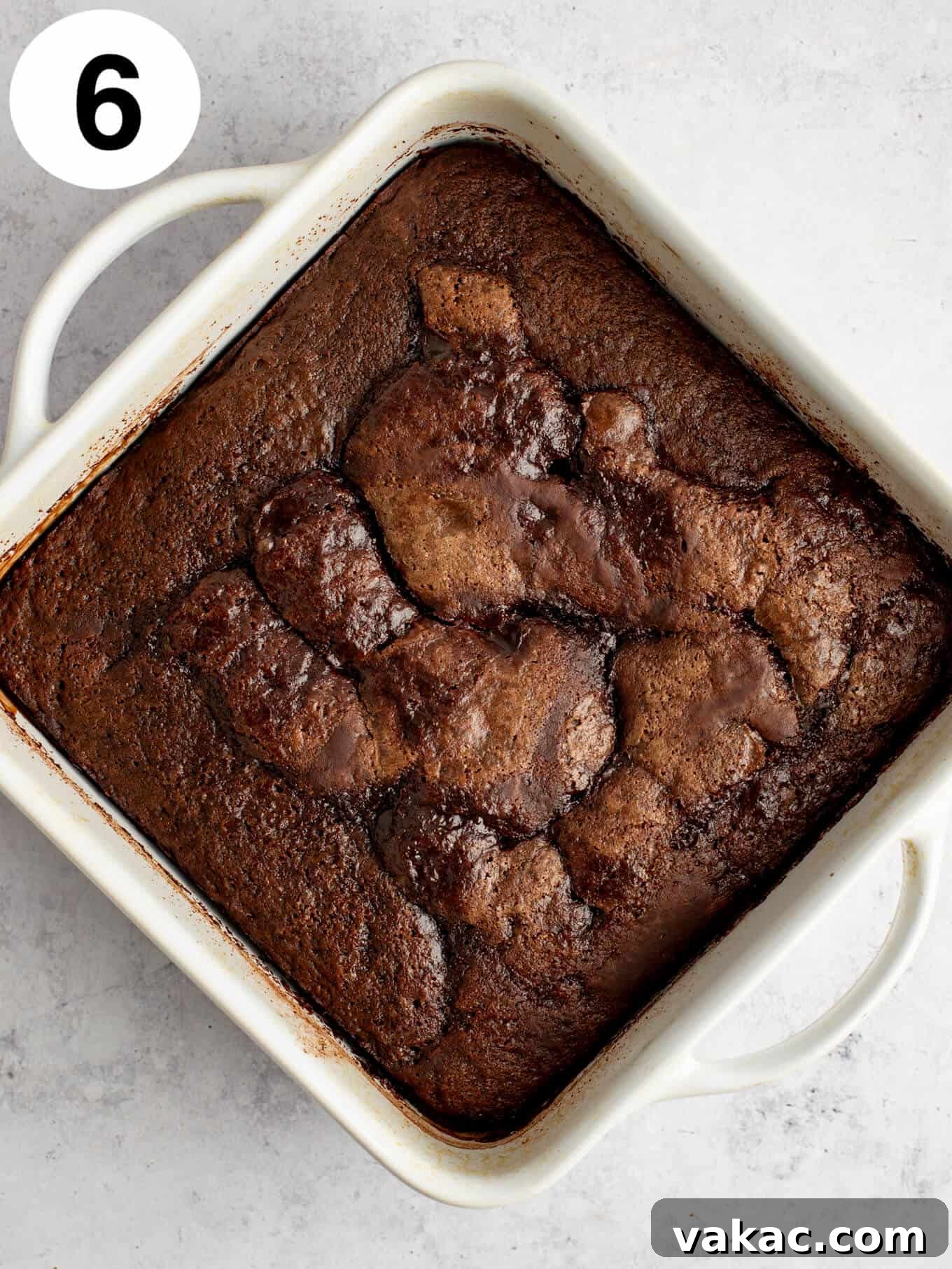 Velvet Chocolate Indulgence 9 An overhead view of baked chocolate pudding cake in a square baking dish.