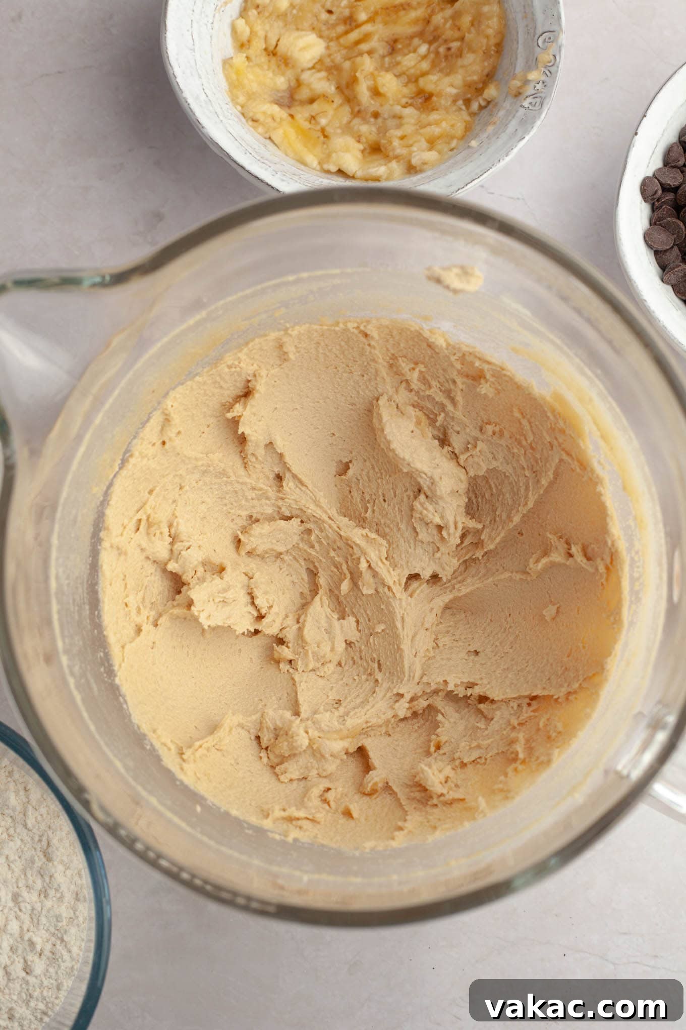 Banana Bliss Chocolate Chip Cookies 5 Butter and sugar creamed together in a glass mixing bowl, light and fluffy.